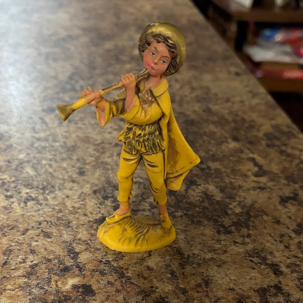Yellow Resin Figurine with Flute